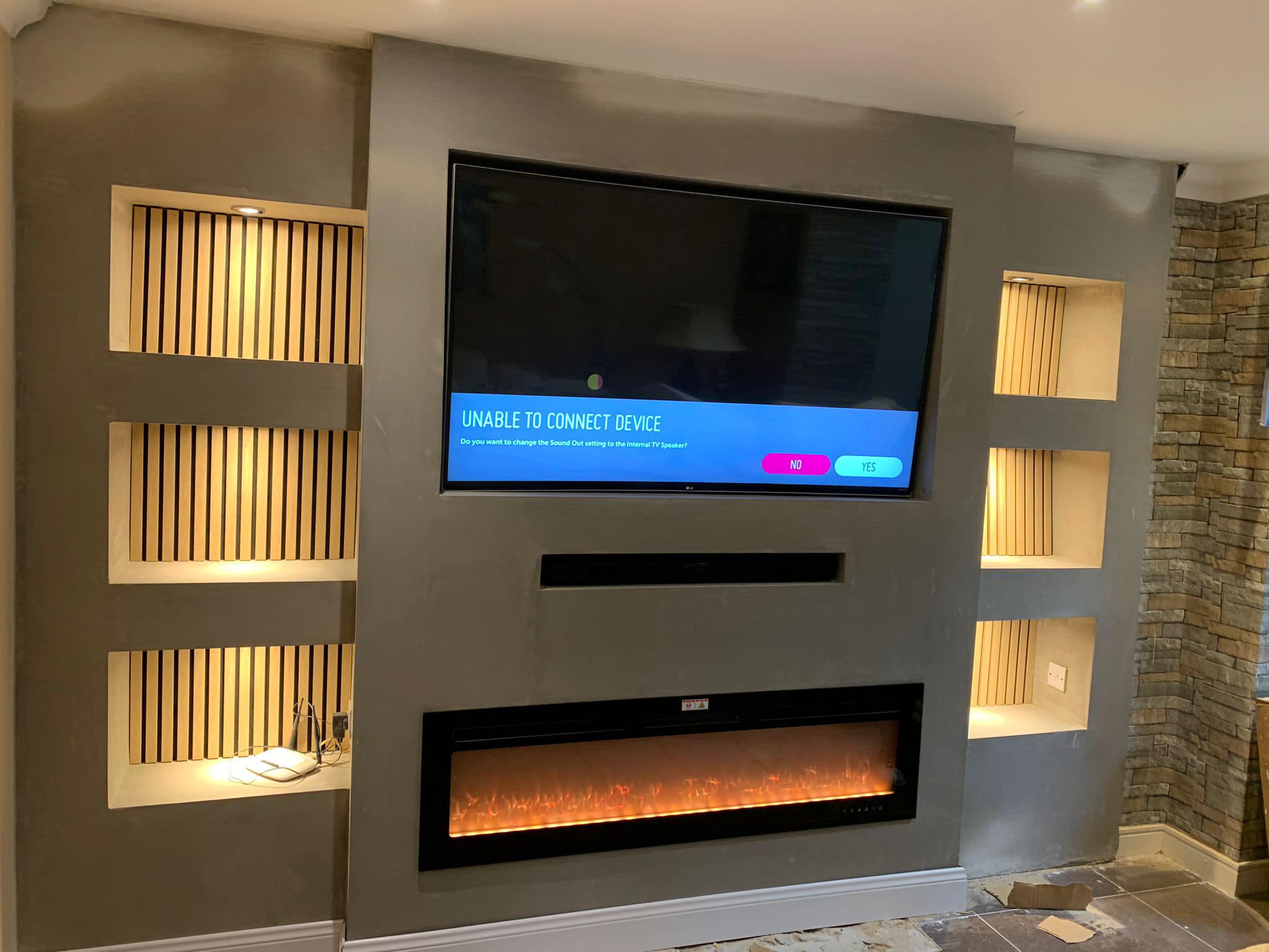 Contemporary media wall with built-in entertainment center